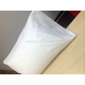 Pure white standard bed pillow core in cotton cover